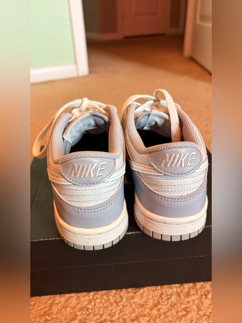 Nike Kids Low-Top Sneakers in Pale Blue and White with no creases.